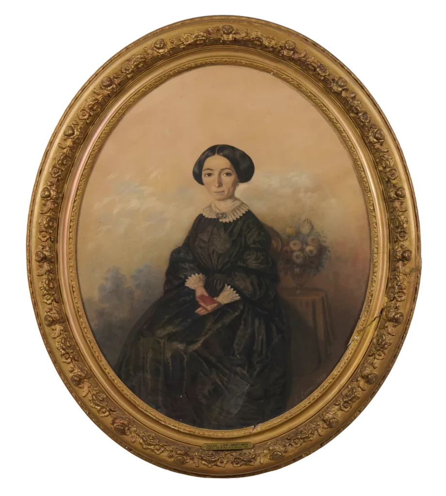 Oval-framed portrait of a woman in dark 19th-century clothing, seated with a red book in her lap. Perfect for Louisiana museums, it features her center-parted hair and a table with flowers beside her.