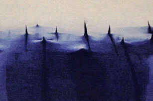 Abstract image showing sharp, dark blue spikes or peaks rising from a lighter blue surface, with a soft gradient background transitioning from blue to beige at the top.