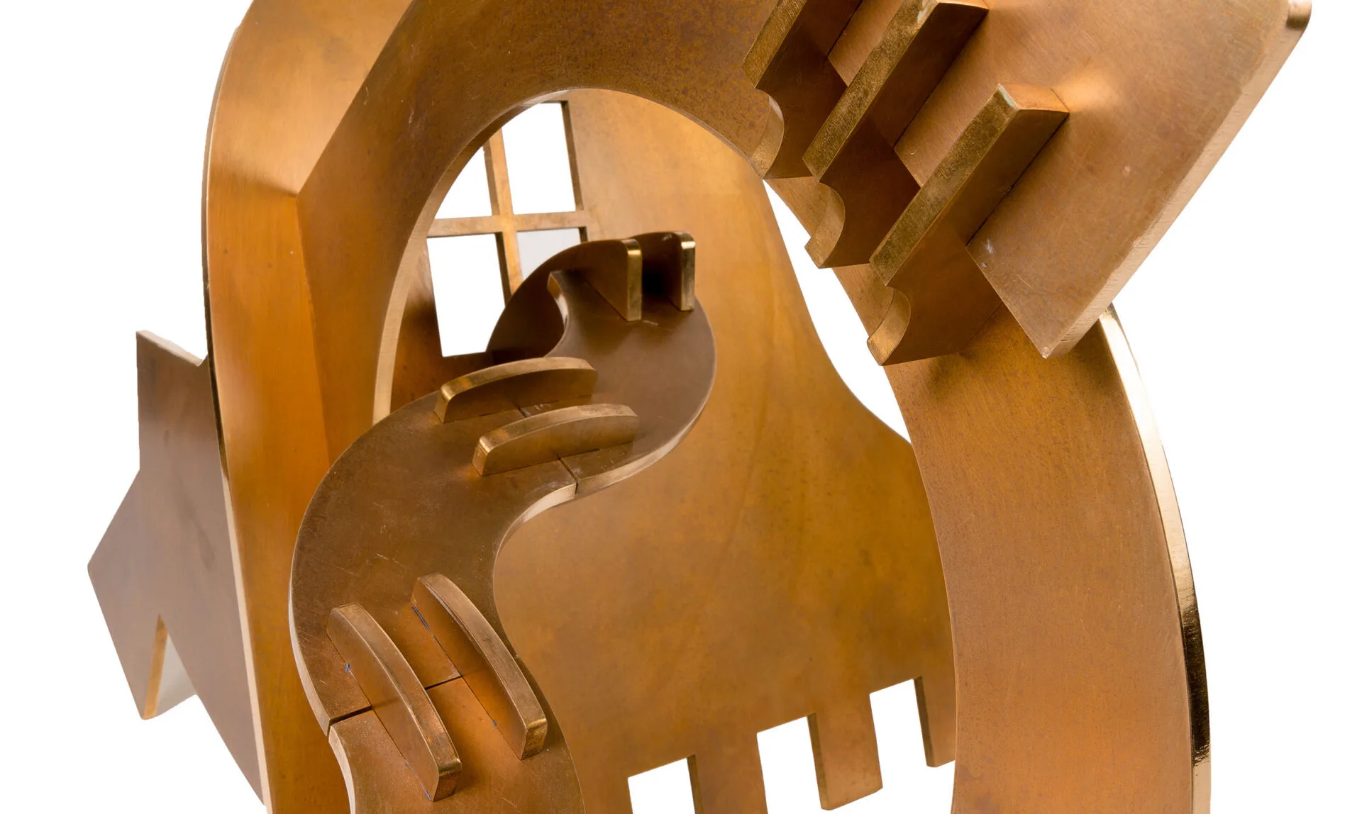 Abstract bronze sculpture with interlocking geometric shapes, including curves, rectangles, and cut-out sections, creating a dynamic and layered composition against a white background.